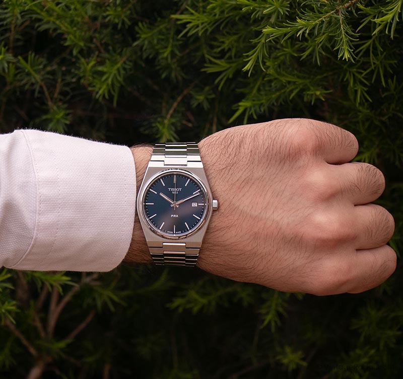 Photo of the Tissot PRX quartz watch on the wrist