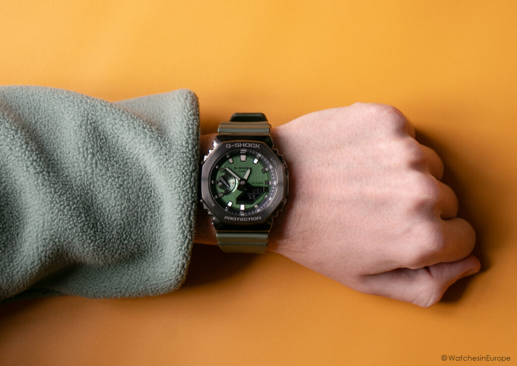 Casio GM2100-3A on the wrist with hoodie